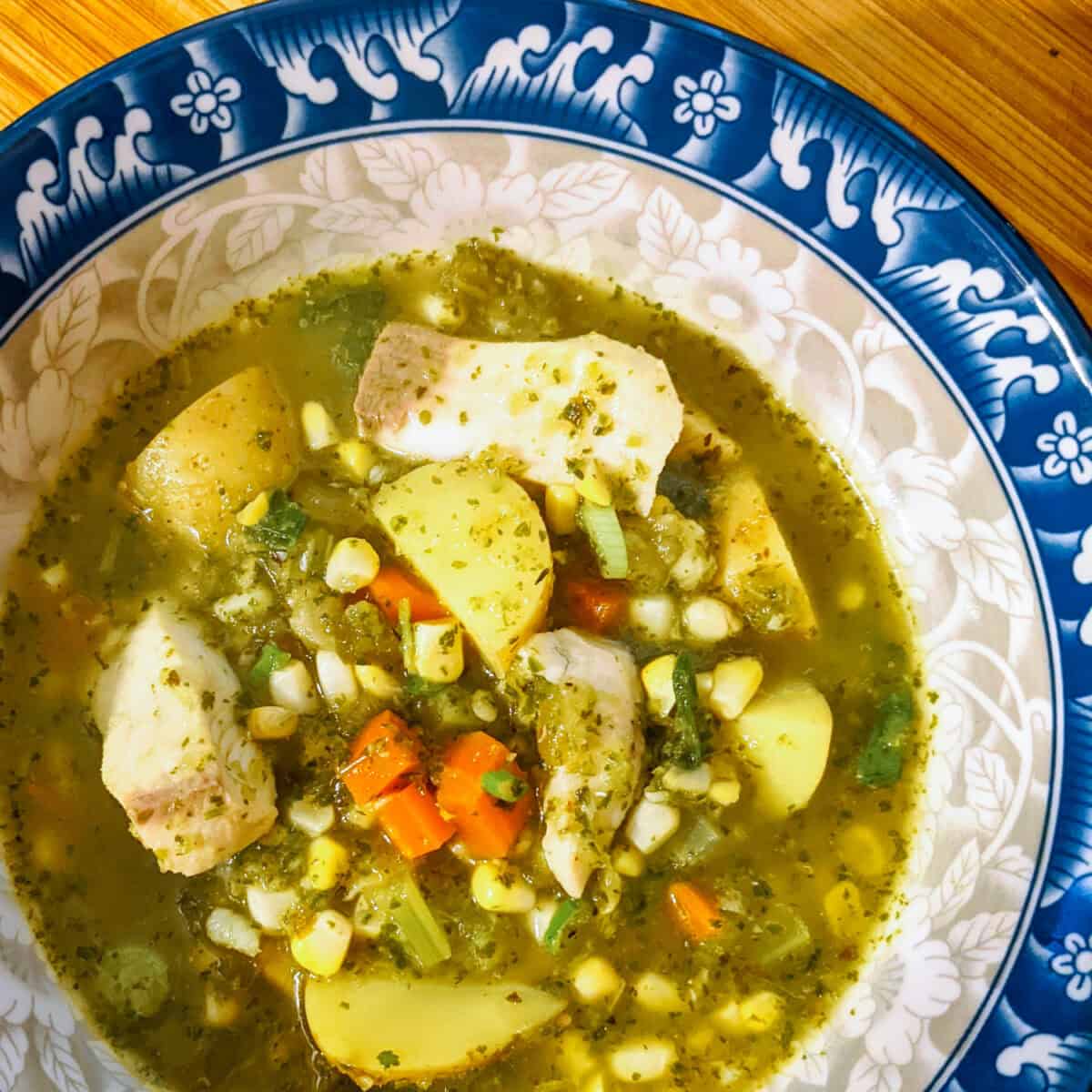 Pepper Yam Fish Soup in a blue and white decorated bowl
